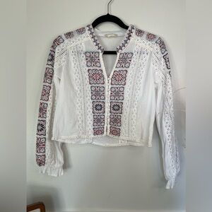 White embroidered crop top from Altar’d State